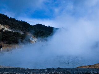 sulfur fumes coming out of the Si kidang crater, Dieng Indonesia.