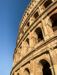 Low angle view of ancient roman empire architecture of the Colosseum, Rome, Italy