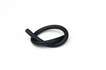Black rubber fuel hose isolated on white background.