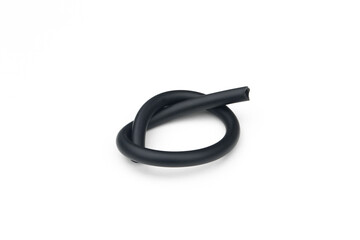 Black rubber fuel hose isolated on white background.