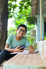 Fototapeta premium indian child attending online lecture