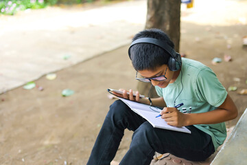 indian child attending online lecture