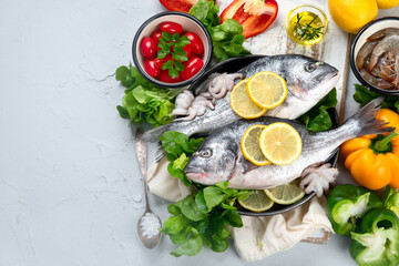 Raw dorado fish with vegetables.