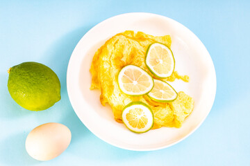 A fresh and simple egg omelette in lemon juice