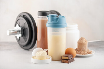 Protein sport shake, powder eggs and bar. Fitness food and drink. Diet