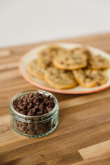 Fototapeta na wymiar Homemade Chocolate Chip Cookies on Walnut Butcher Block