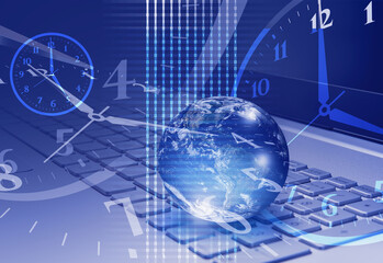 Glass globe on laptop keyboard with time