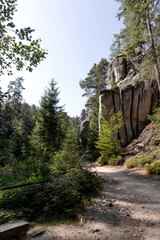 Hiking path through the majestic sandstone rock walls. Adrspach rock city, Czech Republic, Europe