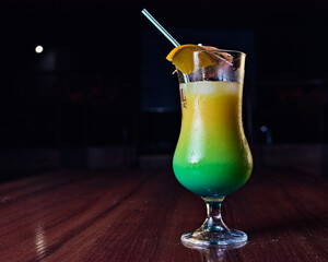 Tequila Sunrise chilled close-up on a dark background.