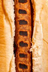 Barbecued vegetable sausage. Detailed closeup vegan food macro background.