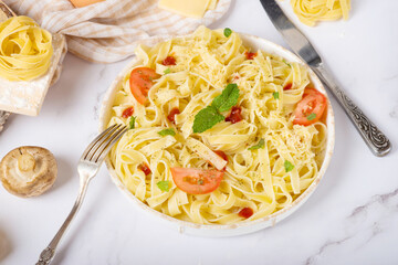 tagliatelle pasta on a white table, italian menu