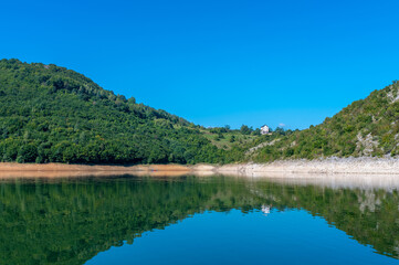 Beautiful mountain landscape, clear lake water with rocks and trees. Uvac canyon, Serbia