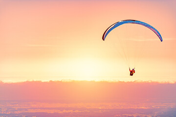 Paraglider at sunset in Germany, Europe