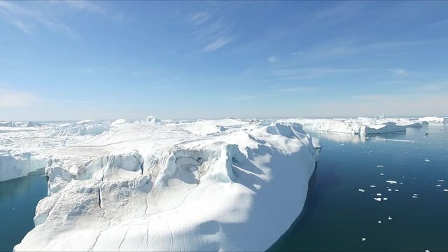 Greenland. An aerial view. Drifting icebergs.