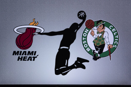 ORLANDO, USA. SEPTEMBER. 19: NBA Conference final Miami Heat vs. Boston Celtics. Season 2020 in bubble. Basketball player silhouette. Teams logo on the big screen in background.