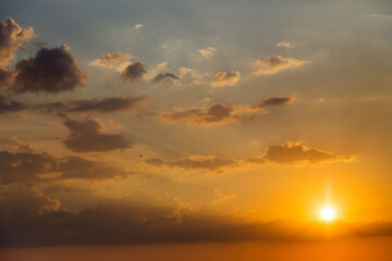 Evening sky with colorful cloud on twilight, Dusk. Sunset / sunrise with clouds, light rays and other atmospheric effect