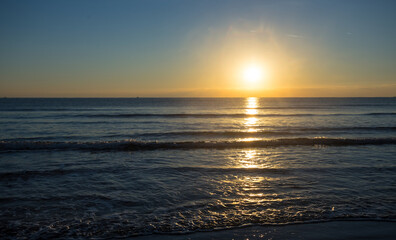 sunset over a quiet sea bay, summer sea vacation scene