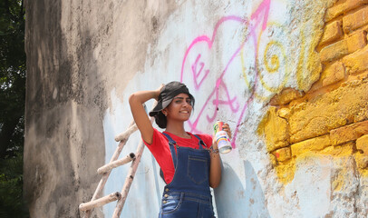 Mexican Beautiful Girl posing against the wall
