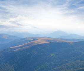 mountain ridge in a blue mist, outdoor mountain travel background