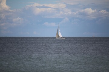 white sailing boat on the sea in germany