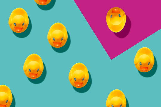 yellow rubber ducks on turquoise blue background