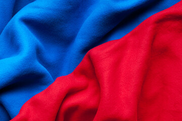 Background texture of red and blue fleece, close-up