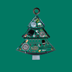 New car spare parts Christmas fir tree for shop. Concept of a new year. Trendy color ultramarine green.