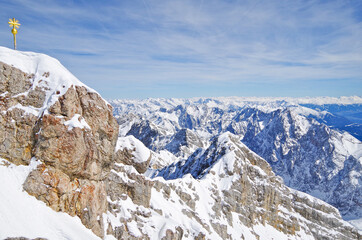 Panoramic landscape and scenic view over Alpine mountains and mountain range from Zugspitze summit...