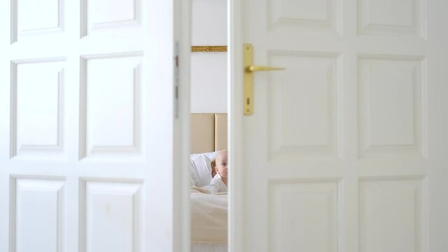 Doors Open, Baby Woke Up Next To Sleeping Mom In The Bedroom