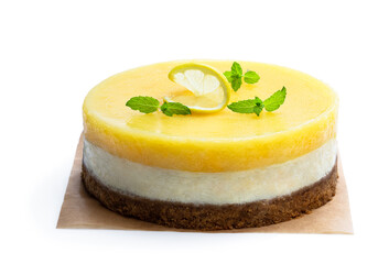Homemade Layered Lemon Cheesecake isolated on white