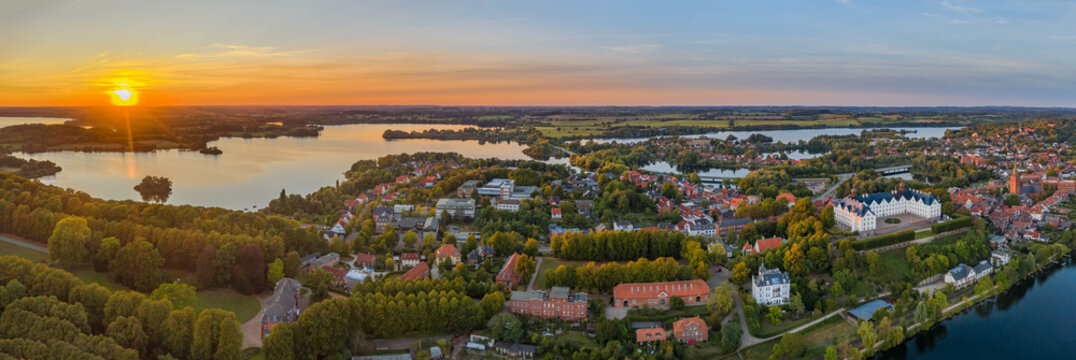 Panorama aerial view of castle Plon (Pl&ouml;ner Schloss) on the shore of lake Plon (Pl&ouml;ner See) and its surrounding landscape Schleswig-Holstein, Germany