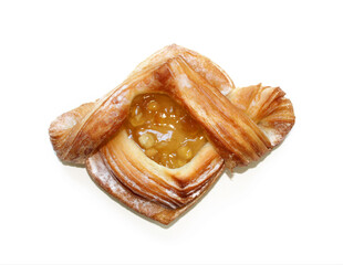 Sweet bun with apple jam isolated on white background.