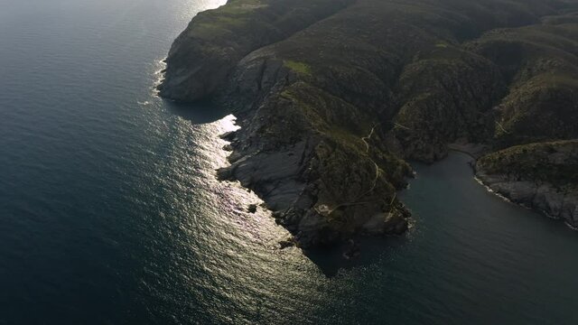 Aerial view on Mediterranean sea coast with lighthouse, Cadaques, Catalonia, Spain