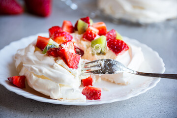 Delicious Pavlova cake with meringue and fresh fruit