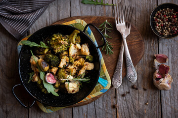 Cauliflower, broccoli and other cooked vegetables with rosemary