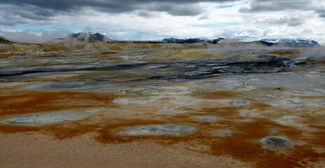 Unique geothermal valley Hverir in Iceland. Namafjall Geothermal Area. Surreal landscape like on...
