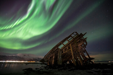 Shipwreck under the auroras (northern lights)