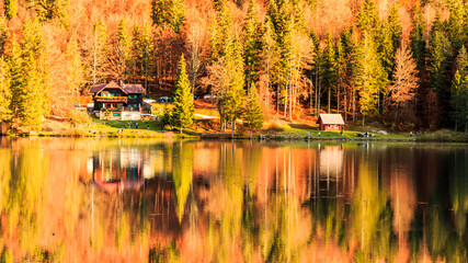 Colorful autumn foliage at the alpine lake