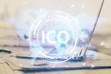 Double exposure of blockchain theme hologram and table with computer background. Concept of bitcoin...