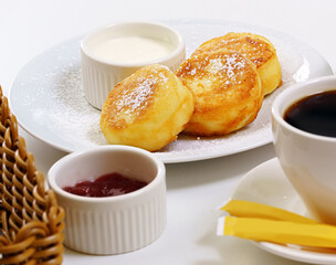 Set table with porridge cheesecakes coffee in cafe