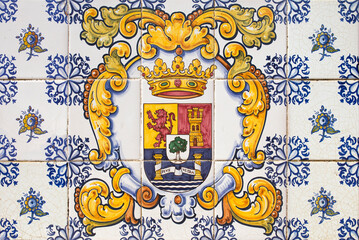 Coat of arms of Extremadura on glazed tiles, Caceres, Spain