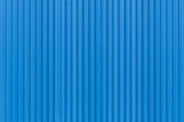 Modern blue stone wall with stripes texture and seamless background