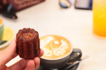 Canelé with coffee