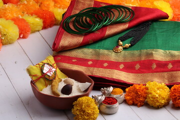 oti bharne - Indian ritual of offering a sari and a blouse piece along with coconut, haldi kumkum,...