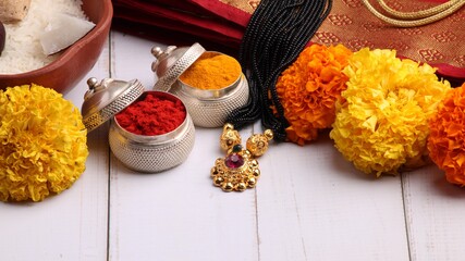oti bharne - Indian ritual of offering a sari and a blouse piece along with coconut, haldi kumkum,...