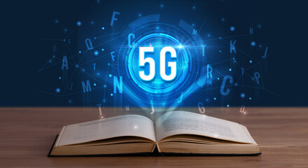 5G inscription coming out from an open book, digital technology concept