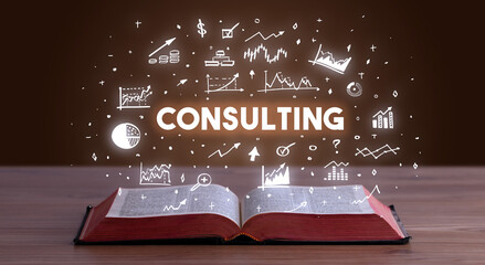 CONSULTING inscription coming out from an open book, business concept