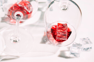 Glasses of Red wine. The play of light and shadow.