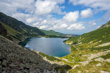 Fototapeta na wymiar Black Pond Gasienicowy beautiful clean lake in the Polish Tatra Mountains.
