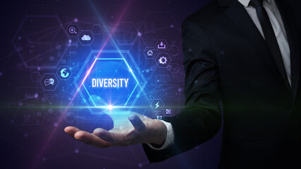 Man hand holding DIVERSITY inscription, social media concept